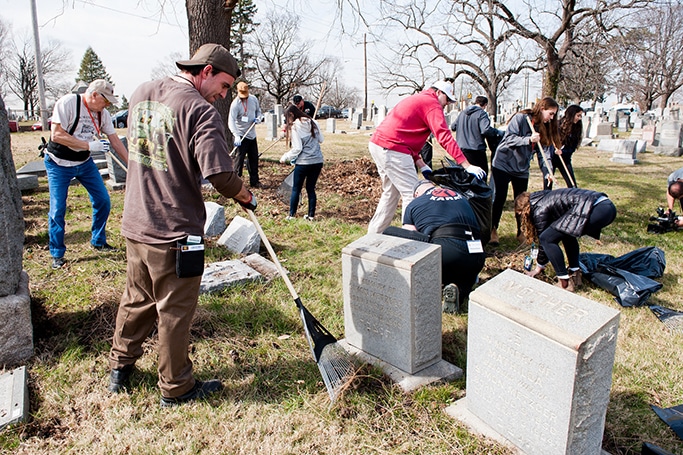 Volunteers cleaning up Mt. Carmel Cemetery
