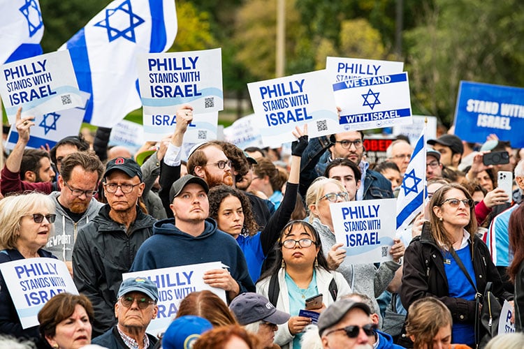 People holding signs